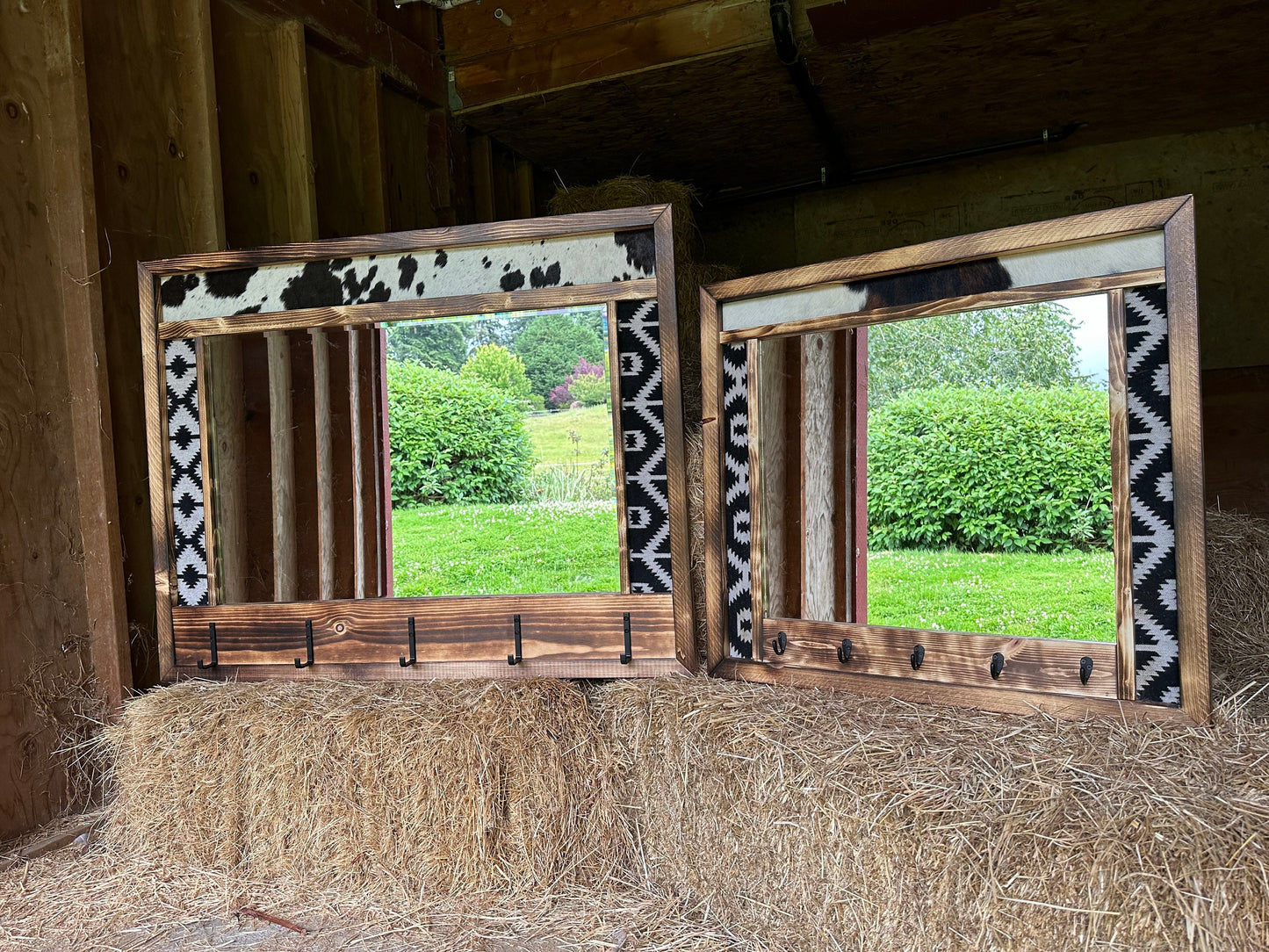 Cowhide framed mirror with hangers