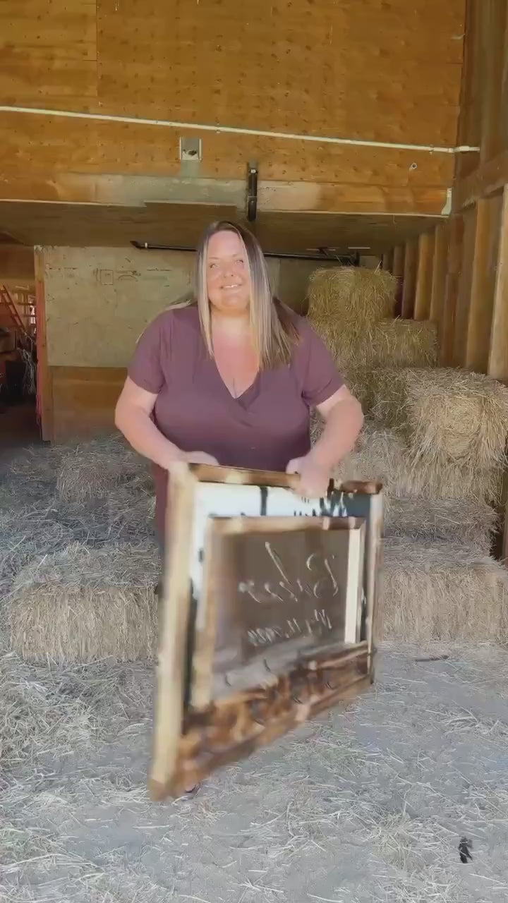 Cowhide framed mirror with hangers
